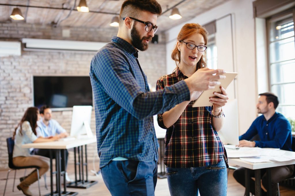 company coworkers working in office zb3k6pr 2048x1365 1